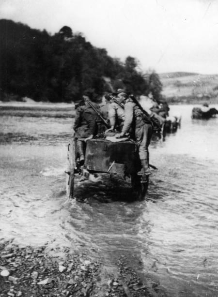 Operation Vistula in the Sanok Powiat. Soldiers of the Polish Army crossing the Sian River, 1947.