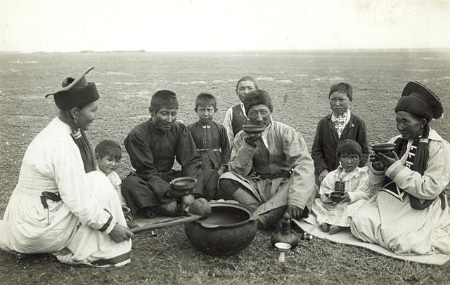 Kalmyks drinking tea in the steppe of Salsky District, Don Host Oblast, Russia